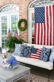 A welcoming front porch with rocking chairs and a glass of sweet tea, symbolizing warmth and generosity.